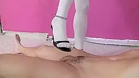 Sexy mistress stomps him in the balls with her heels by Femdom Austria