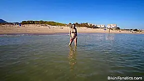 Sheer and sexy on a public beach